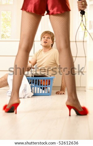stock-photo-woman-wearing-netted-tights-sexy-red-baby-doll-and-high-heels-slippers-holding-lash-forcing-young-52612636.jpg